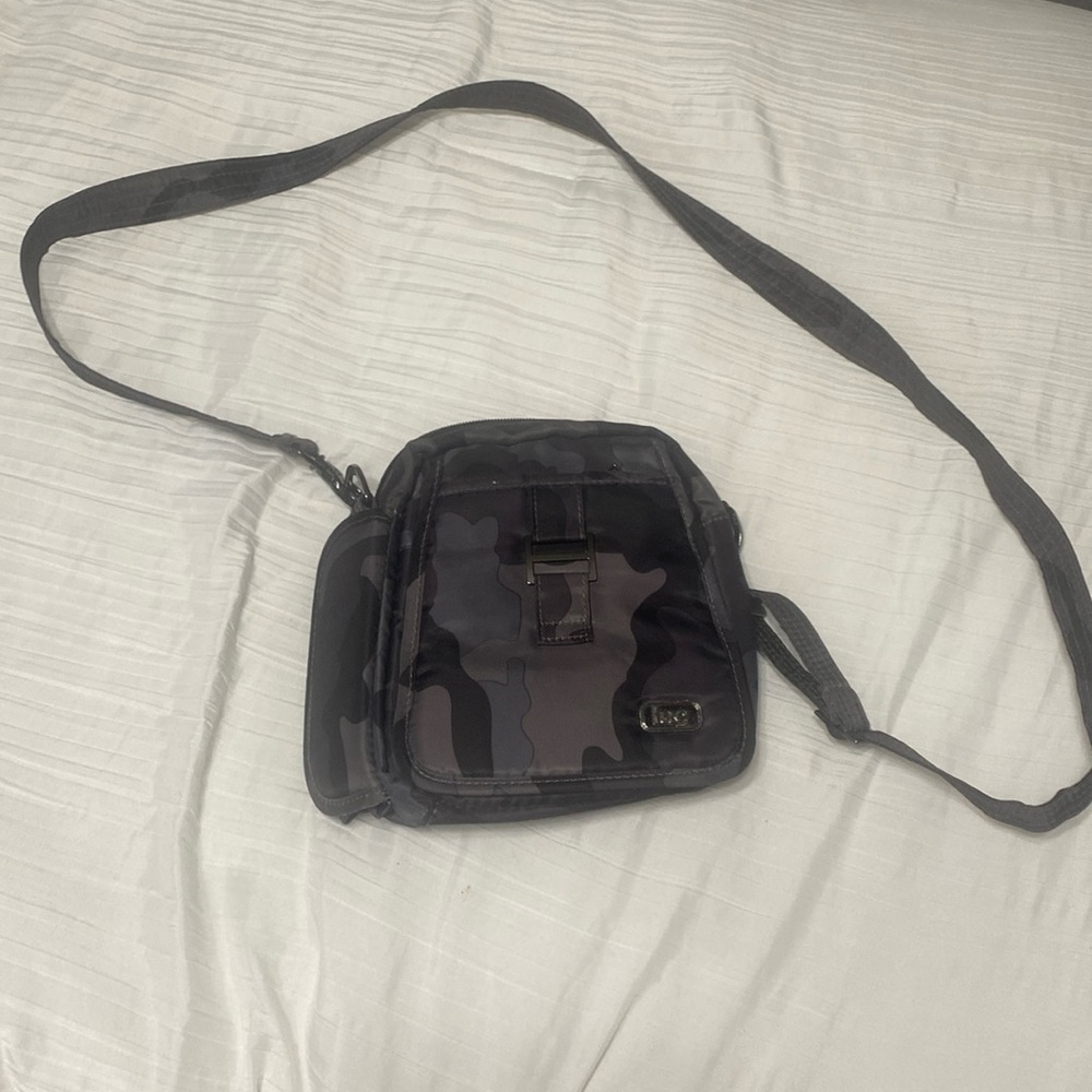Lug crossbody bag. Does have some stains on it side